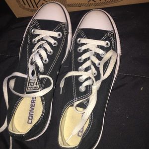 Low top black and white converses